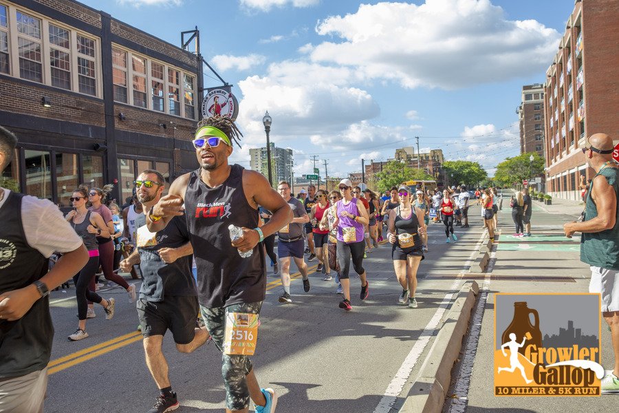 Runners, featuring a man from Black Men Run run club, at starting line of Detroit Growler Gallop Atwater 10 Mile and 5K race